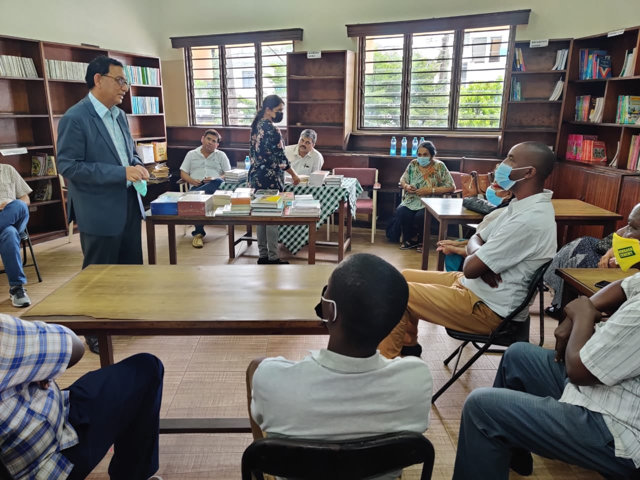Presentation of books on India's heritage and literary masterpieces for setting up India Corner at Arya Samaj School in Mombasa. Chairman, Trustees, Head Master, Teachers and Students of Arya Samaj attended the presentation ceremony.